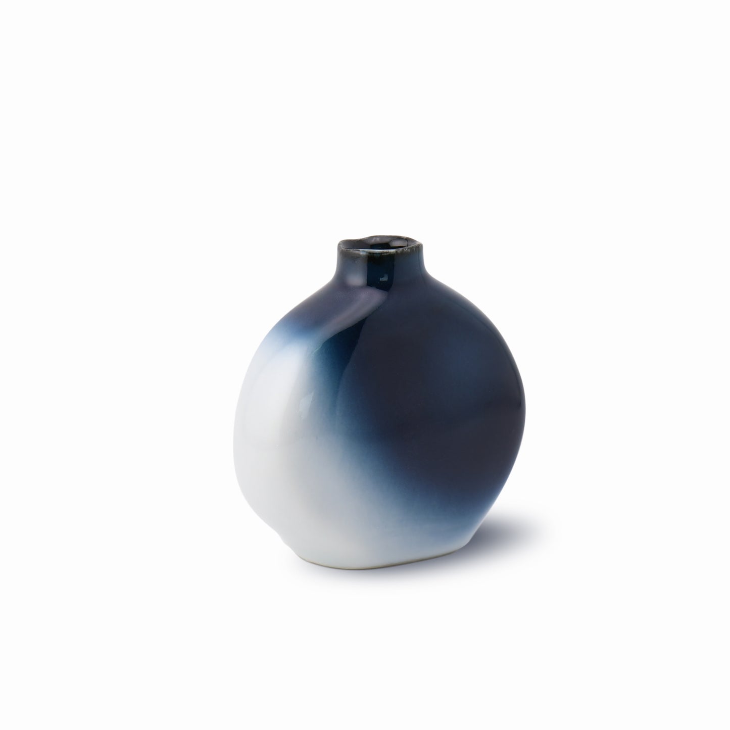 The rear view of the Yoi bud vase featuring twilight gradient glaze in a minimalist silhouette by Yoshito Takenishi.