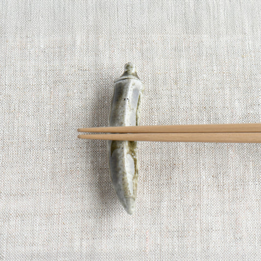 Bizen okra chopstick rest by Masato Miura shown with wooden chopsticks