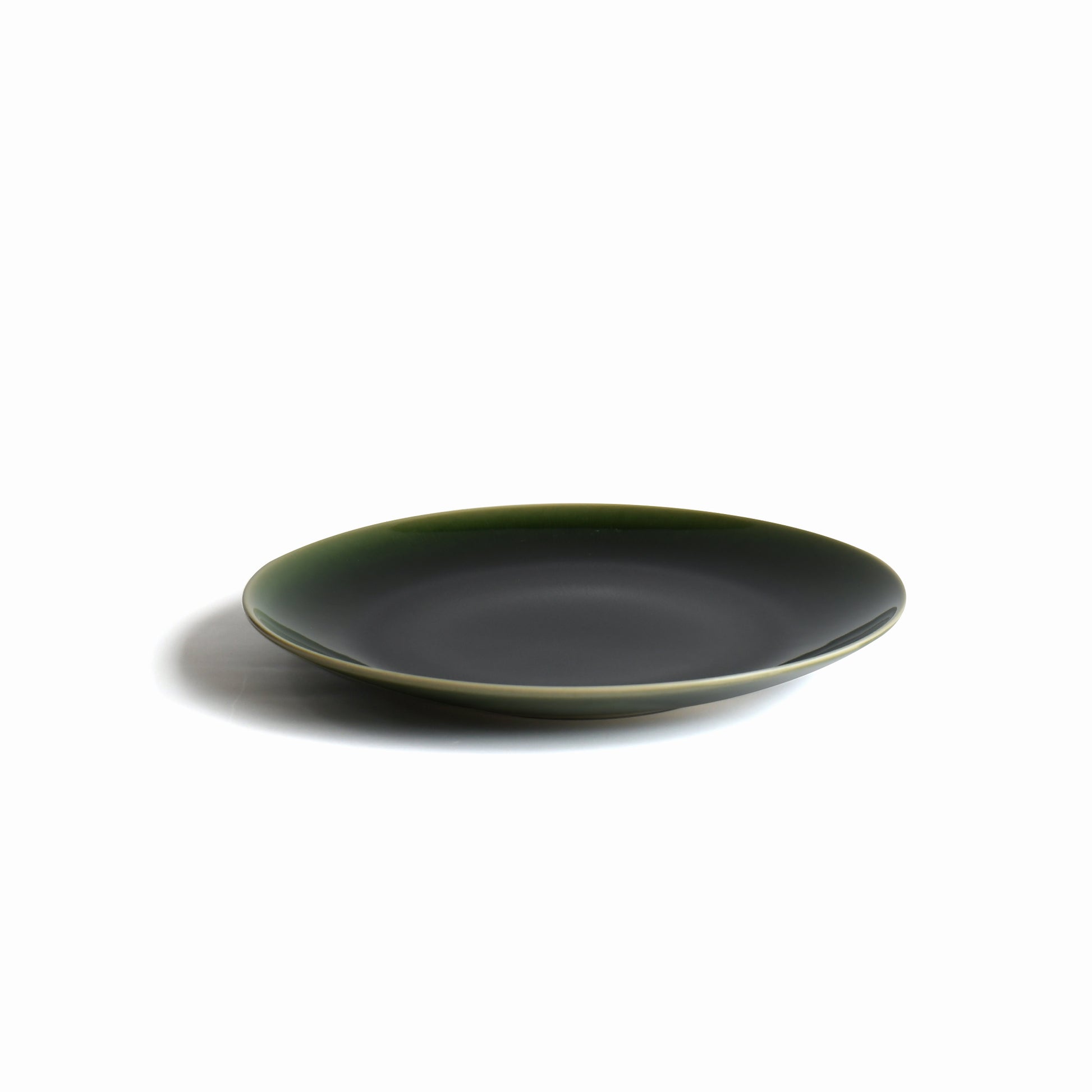 Suiran Japanese flat dinner plate with a deep emerald green glaze and gently raised rim