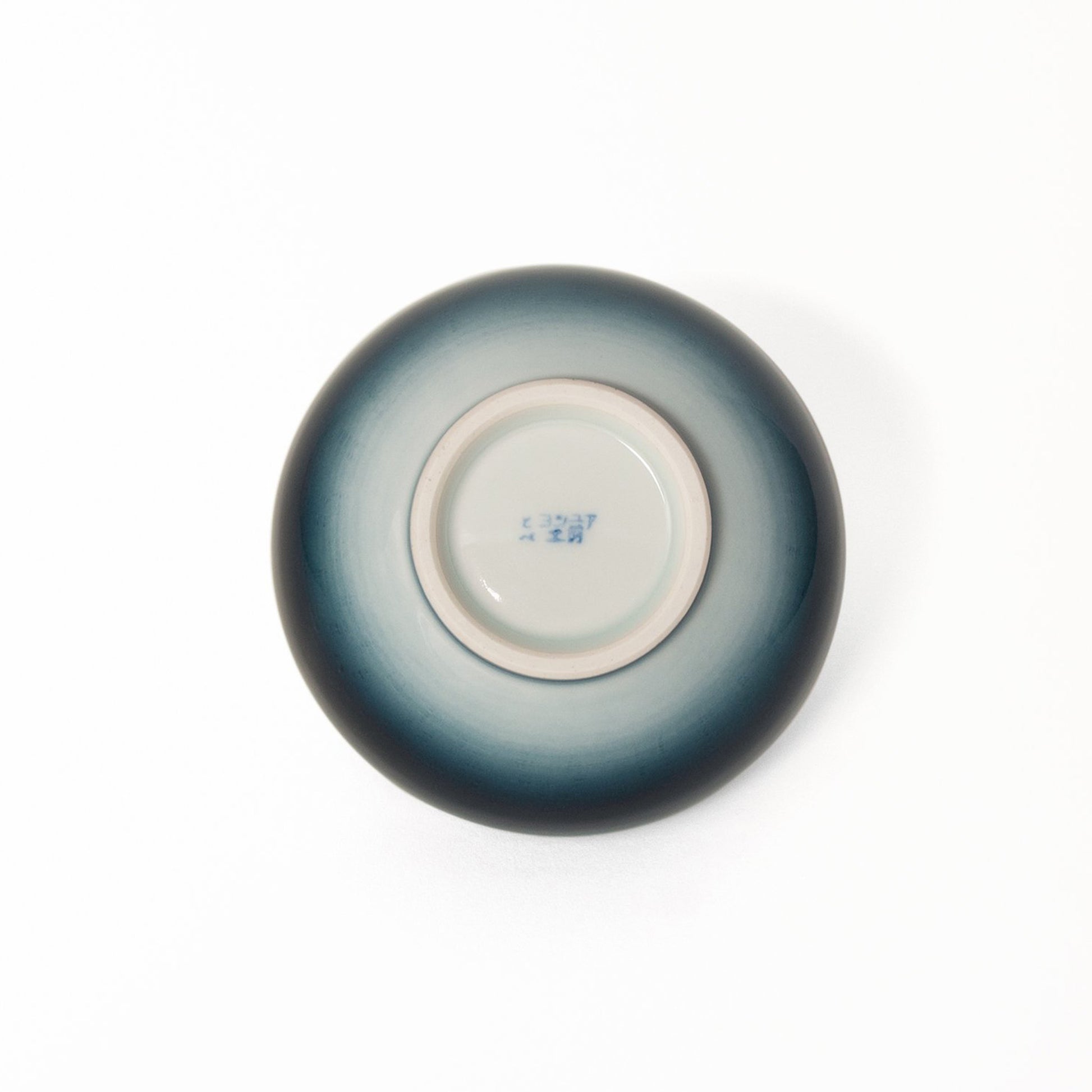 Bottom view of donburi bowl with the artist's signature.