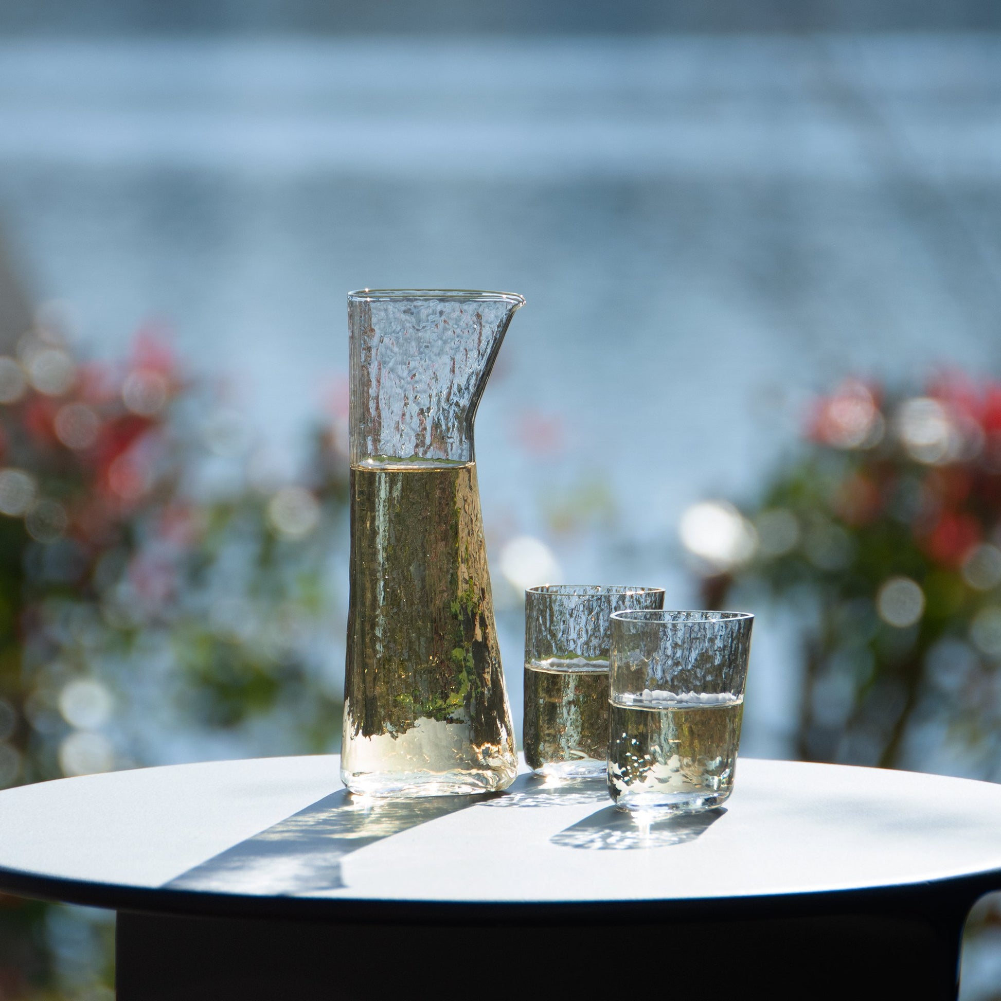 Two sake cups with unique shape carafe modern glassware