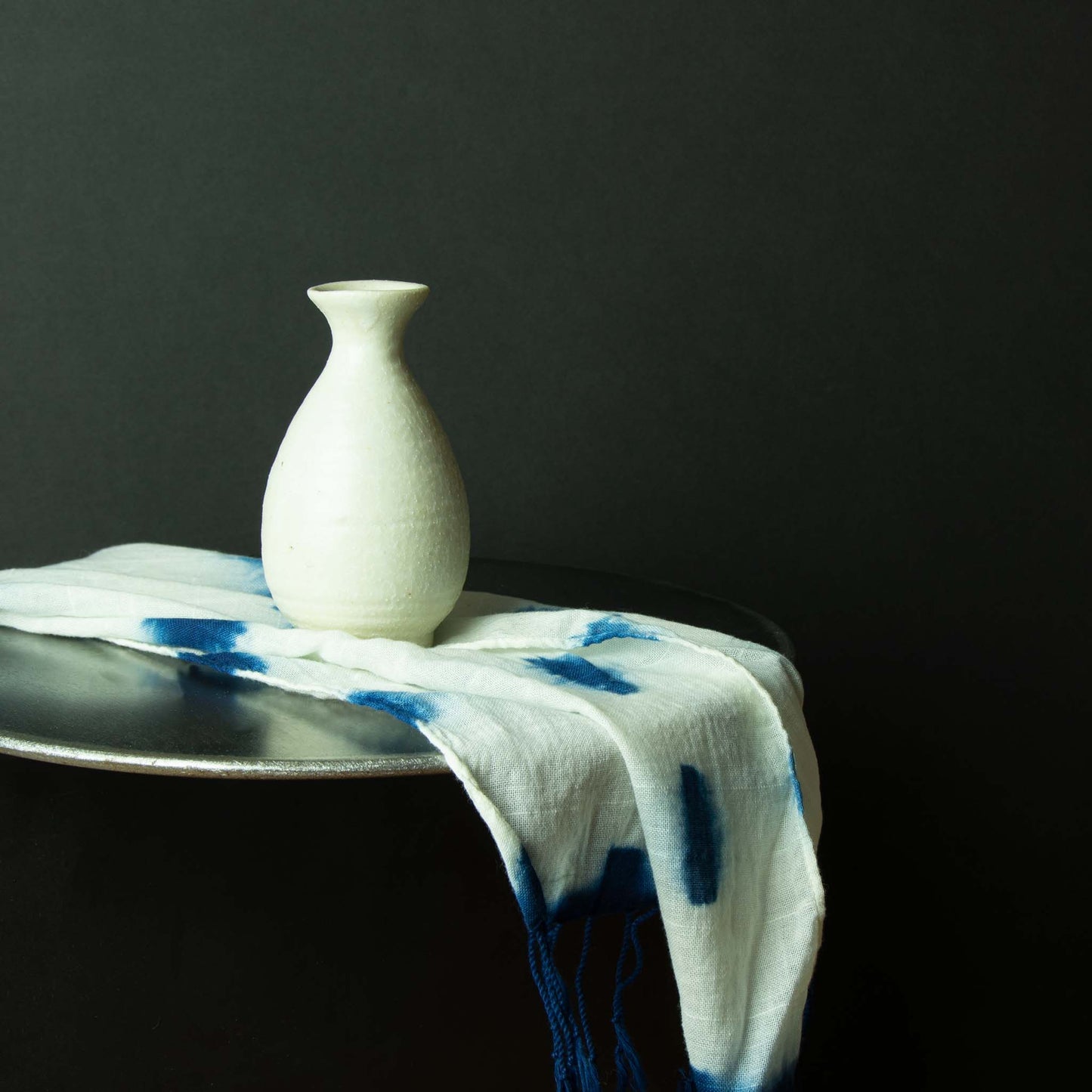 Off-white textured sake container 